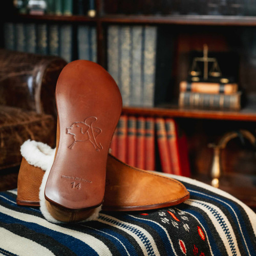 Sheepskin moccasins with a full leather sole by Saddleback.
