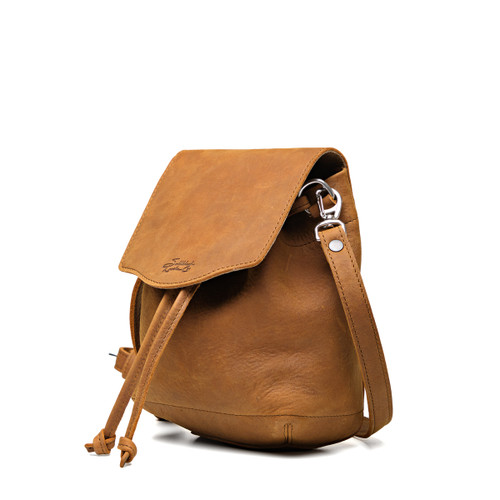 Tobacco leather hobo sack purse with flap closed and sideways. Made by Saddleback