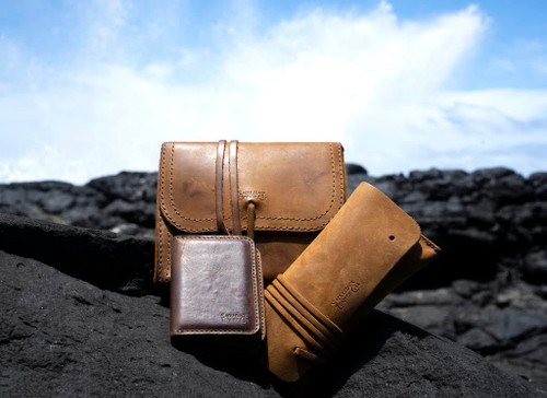 Here is the cash and receipt bag with our other wallet and organizer out by the beach. Made by Saddleback